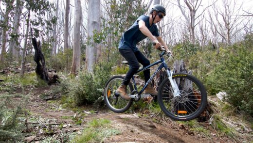 Riding mountain shop bike on road