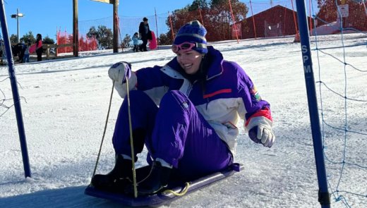 woman tobogganing