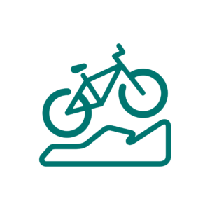 A green outline vector image of a green mountain bike going up an incline